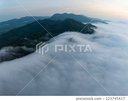 Drone aerial view of landscape fog over mountains in sunrise sky,High angle view over countryside at Southeast asia,Phang Nga Thailand,Wide angle view nature landscape 123745417