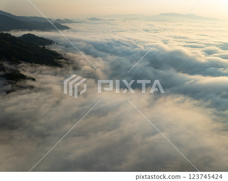 Drone aerial view of landscape fog over mountains in sunrise sky,High angle view over countryside at Southeast asia,Phang Nga Thailand,Wide angle view nature landscape Drone aerial view of landscape fog over mountains in sunrise sky,High angle view over countryside at Southeast asia,Phang Nga Thailand,Wide angle view nature landscape 123745424
