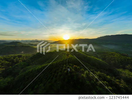Aerial view landscape mountains view in sunset or sunrise sky background Aerial view landscape mountains view in sunset or sunrise sky background 123745444
