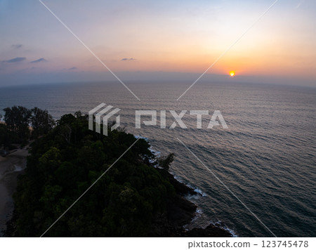 Aerial view sunset sky,Nature beautiful Light Sunset or sunrise over sea,Colorful dramatic majestic scenery sunset Sky with Amazing clouds and waves in sunset sky purple light cloud background 123745478