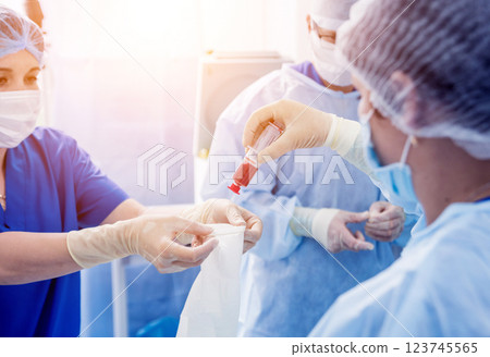 Platelet-Rich plasma preparation. Plasma in syringe. Centrifuge. 123745565