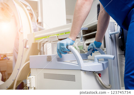 Process of trauma surgery operation. Group of surgeons in operating room  123745734