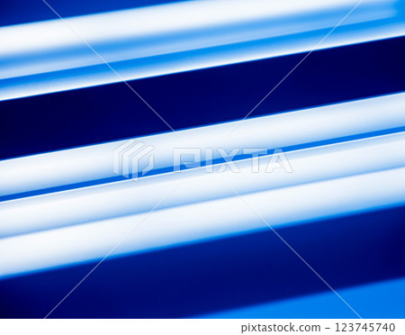 Blue metallic roof tiles background with drops of water. 123745740