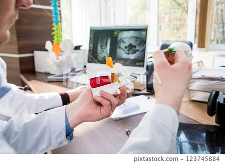 Doctors team having medical council in hospital. Discussing medical issues. Doctors team having medical council in hospital. Discussing medical issues. 123745884