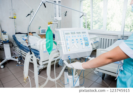 Doctor give resuscitation to patient in the emergency room. Cardiac massage Doctor give resuscitation to patient in the emergency room. Cardiac massage 123745915