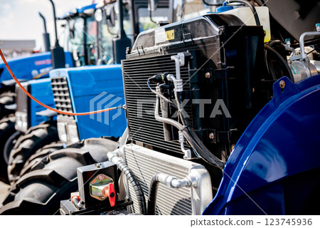 Modern new agricultural tractor engine. Machinery and equipment 123745936