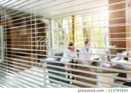 Two doctors having medical council in hospital. Discussing medical issues. Two doctors having medical council in hospital. Discussing medical issues. 123745950