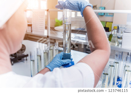 Natural oil quality control. In the industrial laboratory. Natural oil quality control. In the industrial laboratory. 123746115
