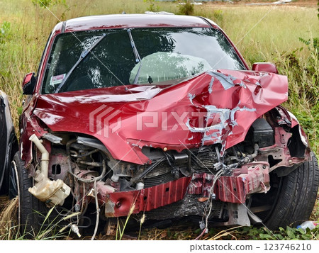 Abandoned cars after accidents in a dense overgrown setting Abandoned cars after accidents in a dense overgrown setting 123746210