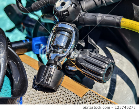 The ready for use scuba divers gear is on the pool edge 123746275