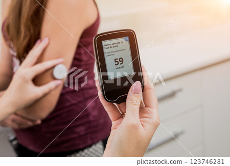 Medical device for glucose check. Continuous glucose monitoring pod. Modern wireless technology. 123746281