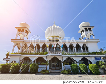 The mosque with the minaret is designed in the Islamic architectural tradition. The mosque with the minaret is designed in the Islamic architectural tradition. 123746395