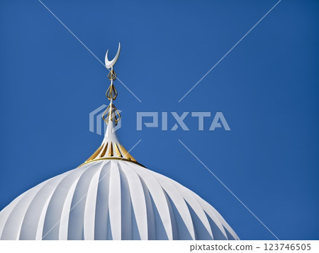 The mosque with the minaret is designed in the Islamic architectural tradition. 123746505