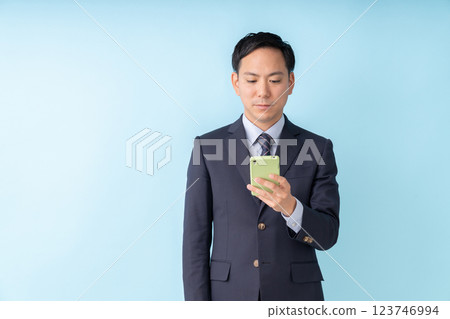 Men business looking at smartphone Men business looking at smartphone 123746994