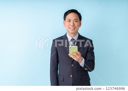 Men business looking at smartphone Men business looking at smartphone 123746996