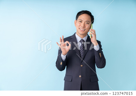 Business man calling Business man calling 123747015