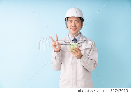 Businessman work clothes smartphone 123747063