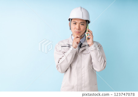 Businessmen work clothes telephone think 123747078