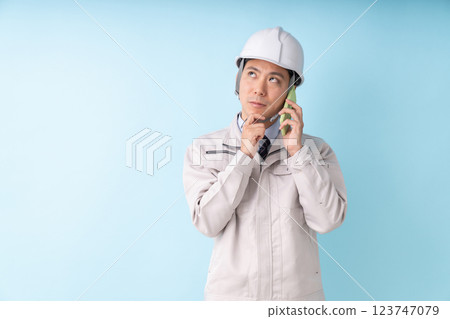 Businessmen work clothes telephone think 123747079