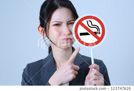 Smoking image of a woman in a suit 123747626