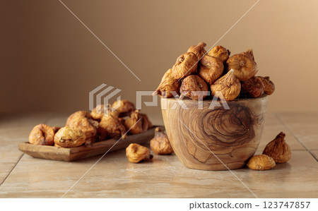 Organic dried figs on a beige background. Organic dried figs on a beige background. 123747857