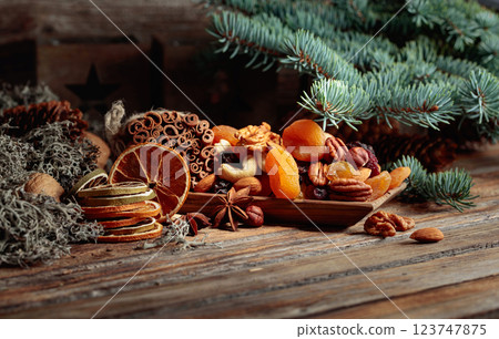 Christmas still-life with dried fruits and nuts. 123747875