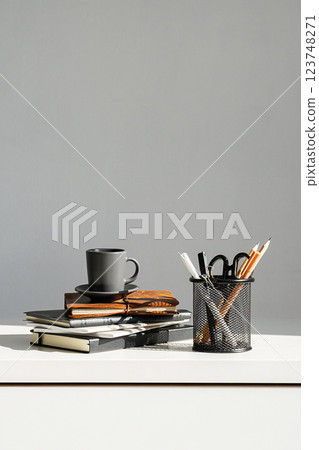Espresso Coffee Cup on Top of Stack Books. Espresso Coffee Cup on Top of Stack Books. 123748271