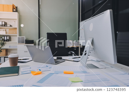 Entrepreneur Asian businessman and businesswoman discussing new business project in tablet in modern Meeting In Modern Office, Asian business casual concept. Entrepreneur Asian businessman and businesswoman discussing new business project in tablet in modern Meeting In Modern Office, Asian business casual concept. 123748395