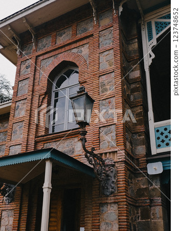 A Beautiful and Historic Building Featuring Stunning Decorative Brickwork and a Lantern 123748652