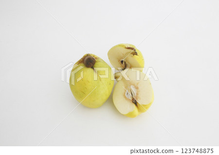 Karin fruit and its cross section Taken with a white background Karin fruit and its cross section Taken with a white background 123748875
