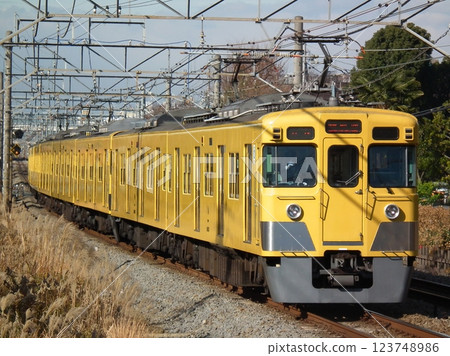 Seibu Shinjuku Line old 2000 series departing from Kokukoen Station 123748986