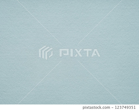A serene aqua blue felt surface that calms the senses, evoking the tranquil essence of a gently flowing mountain stream A serene aqua blue felt surface that calms the senses, evoking the tranquil essence of a gently flowing mountain stream 123749351