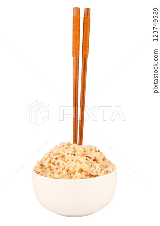 brown rice and barley bowl on white chopsticks brown rice and barley bowl on white chopsticks 123749589