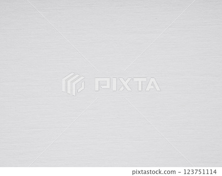 A pristine white canvas of paper, textured with subtle lines, suggests a quiet, understated elegance A pristine white canvas of paper, textured with subtle lines, suggests a quiet, understated elegance 123751114