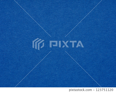 Vivid cobalt blue floods the paper's texture, igniting a sense of boldness and vibrant energy Vivid cobalt blue floods the paper's texture, igniting a sense of boldness and vibrant energy 123751120