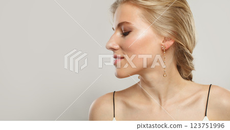 Blond model woman profile, portrait. Beautiful face with healthy clear skin, long shiny hair 123751996