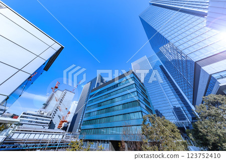 Tokyo city lined with huge buildings Tokyo city lined with huge buildings 123752410