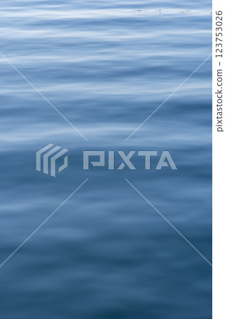 Calm surface of the blue sea Calm surface of the blue sea 123753026