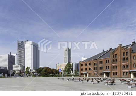 Landscape with red brick warehouse and blue sky Landscape with red brick warehouse and blue sky 123753451