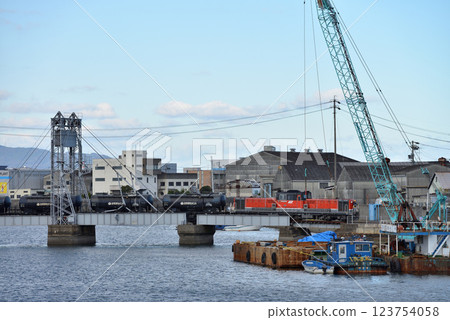 DD511801 cement freight train across Suehiro movable bridge 123754058