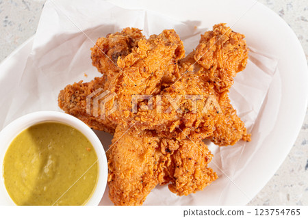 Golden fried chicken with sauce in the cafe 123754765