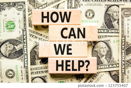 How can we help symbol. Concept words How can we help on beautiful wooden blocks. Dollar bills. Beautiful background from dollar bills. Business and how can we help concept. Copy space. How can we help symbol. Concept words How can we help on beautiful wooden blocks. Dollar bills. Beautiful background from dollar bills. Business and how can we help concept. Copy space. 123755407