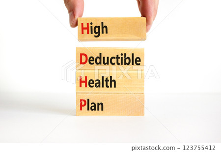 HDHP High Deductible Health Plan symbol. Concept word HDHP High Deductible Health Plan on beautiful blocks. Beautiful white background. Business HDHP High Deductible Health Plan concept. Copy space. 123755412