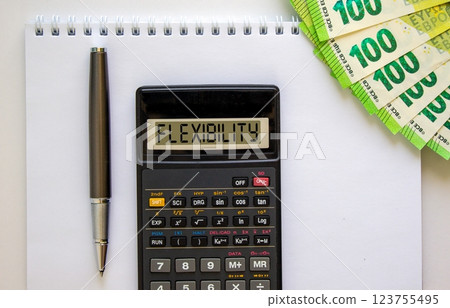 Flexibility symbol. Concept word Flexibility on beautiful black calculator. Beautiful white background. Euro bills. Black pen. Business flexibility concept. Copy space. Flexibility symbol. Concept word Flexibility on beautiful black calculator. Beautiful white background. Euro bills. Black pen. Business flexibility concept. Copy space. 123755495