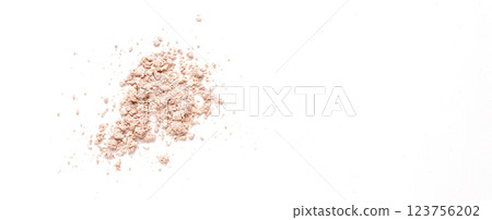 A sample of dry cosmetic clay for a mask or cosmetic powder. White background A sample of dry cosmetic clay for a mask or cosmetic powder. White background 123756202