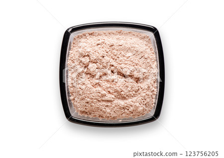 Cosmetic clay for a face mask in a bowl. Isolated on a white background. 123756205