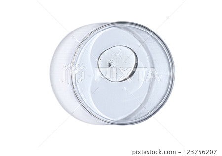 Skin serum or body gel in a Petri dish. Cosmetic product 123756207