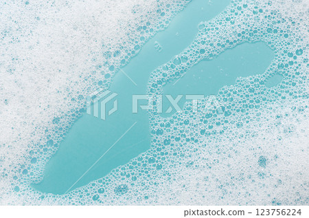 Texture of white foam. Cleansing mousse for the face or bath foam or washing powder. Texture of white foam. Cleansing mousse for the face or bath foam or washing powder. 123756224