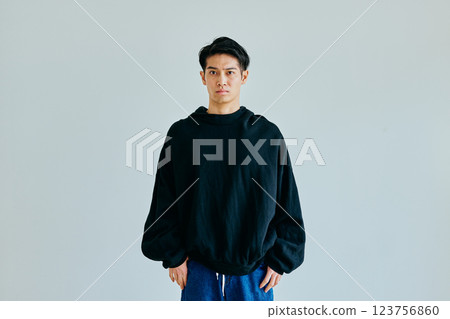 A young man in his 20s wearing casual clothes A young man in his 20s wearing casual clothes 123756860