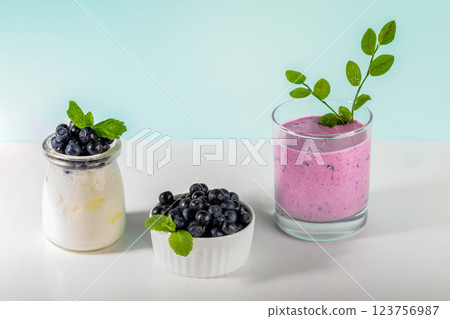 Healthy blueberry blend. Nutrient-rich smoothie featuring blueberries. Smoothie with natural yogurt. Healthy blueberry blend. Nutrient-rich smoothie featuring blueberries. Smoothie with natural yogurt. 123756987